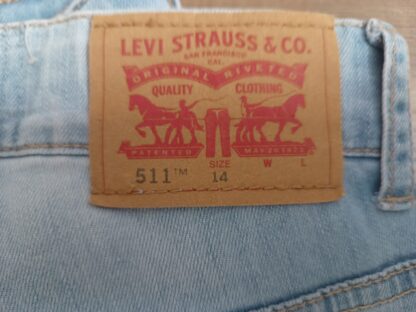 Błękitne spodnie Levis o dopasowanym kroju biodrówki dżinsy z przetarciami bawełniane XS·Bardzo dobry·Levi's - obrazek 4